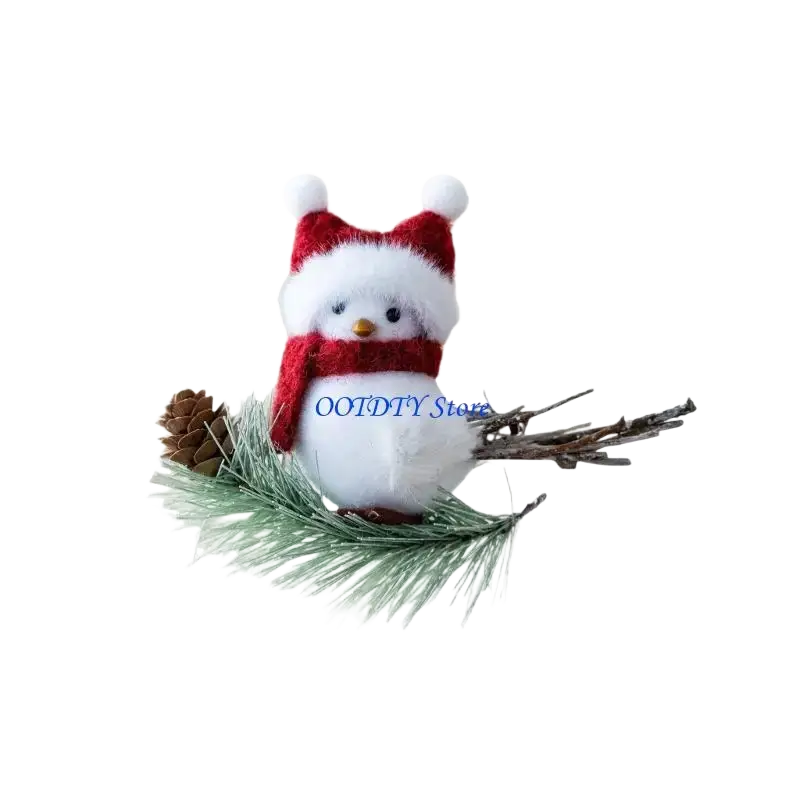 A plush white foam bird christmas ornament wearing a red and white santa hat and scarf perched on a pine branch