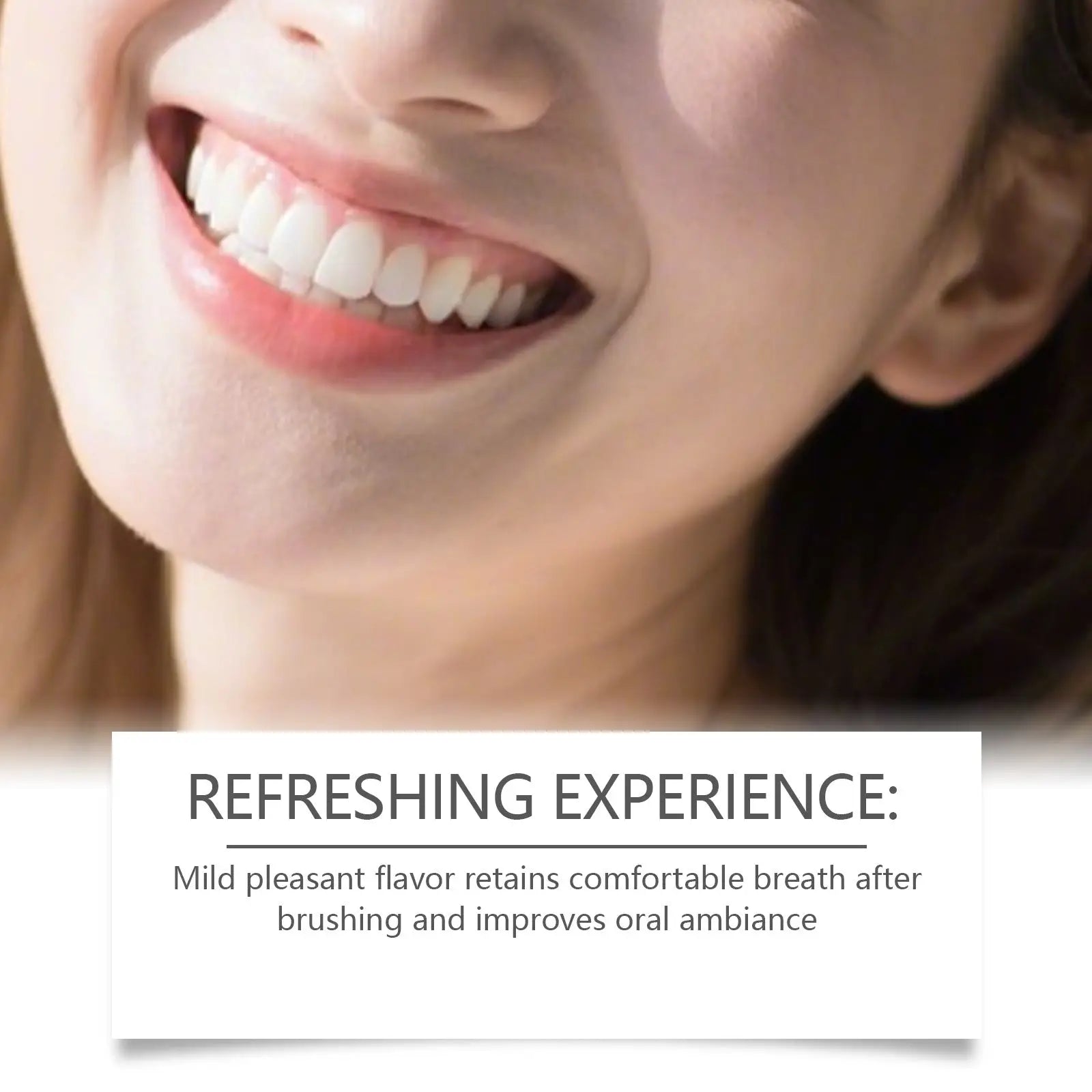 A close-up of a person smiling with bright white teeth using foam toothpaste simply white mousse pump dispenser