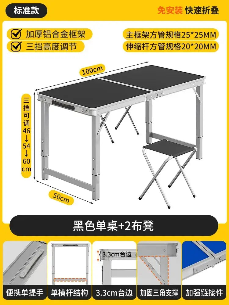 Black folding camping table with silver aluminum frame and adjustable height settings for outdoor use