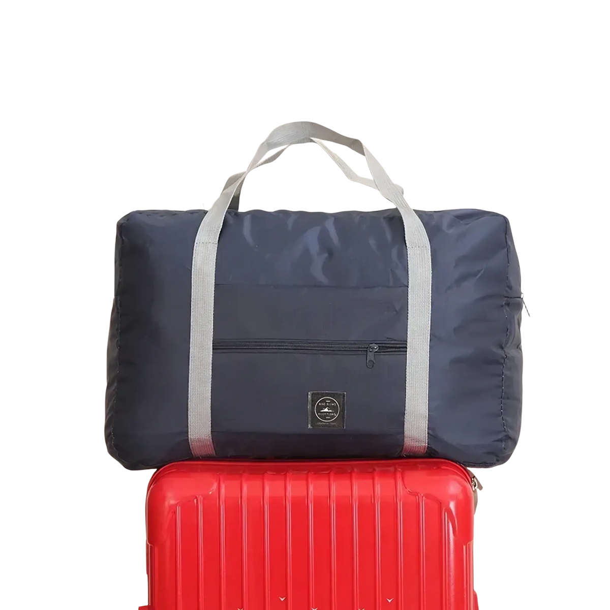 Navy blue foldable canvas travel bag set with gray fabric handles and a small black logo patch