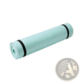 Foldable eva yoga mat in mint green rolled and secured with black elastic bands for exercise and fitness use