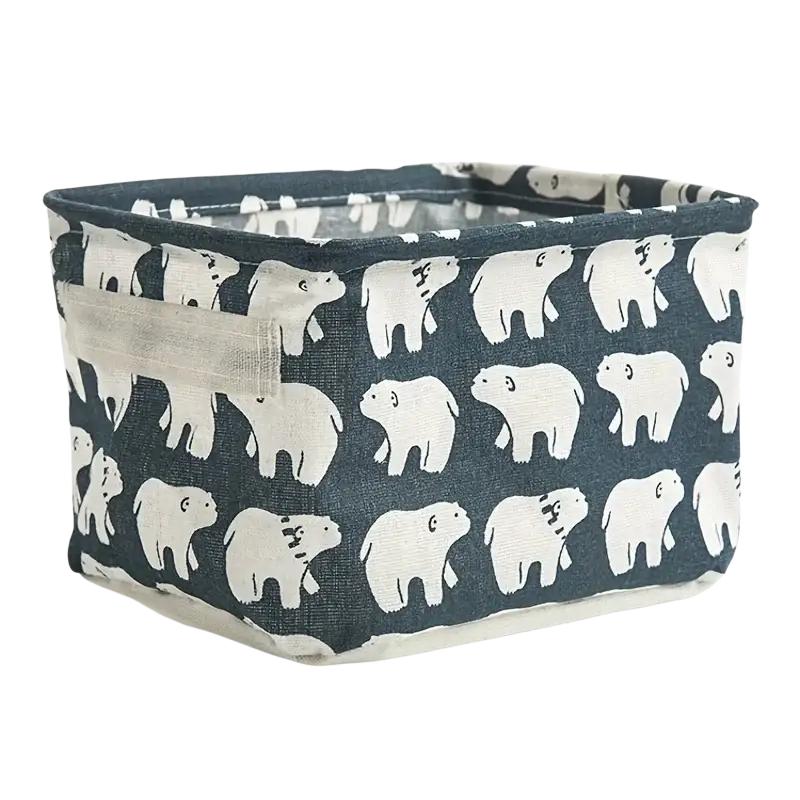 Navy blue foldable fabric storage basket with white polar bear prints and beige handle for organized storage box use