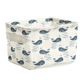 Foldable white fabric storage basket with navy blue whale print designed as a decorative storage box
