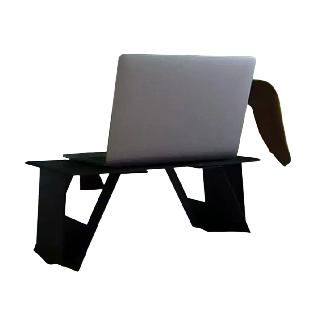 Black foldable laptop stand with angular geometric legs supporting a silver laptop for adjustable portable use