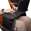 Black foldable laptop stand with adjustable height and sleek minimalist design for portable desk use