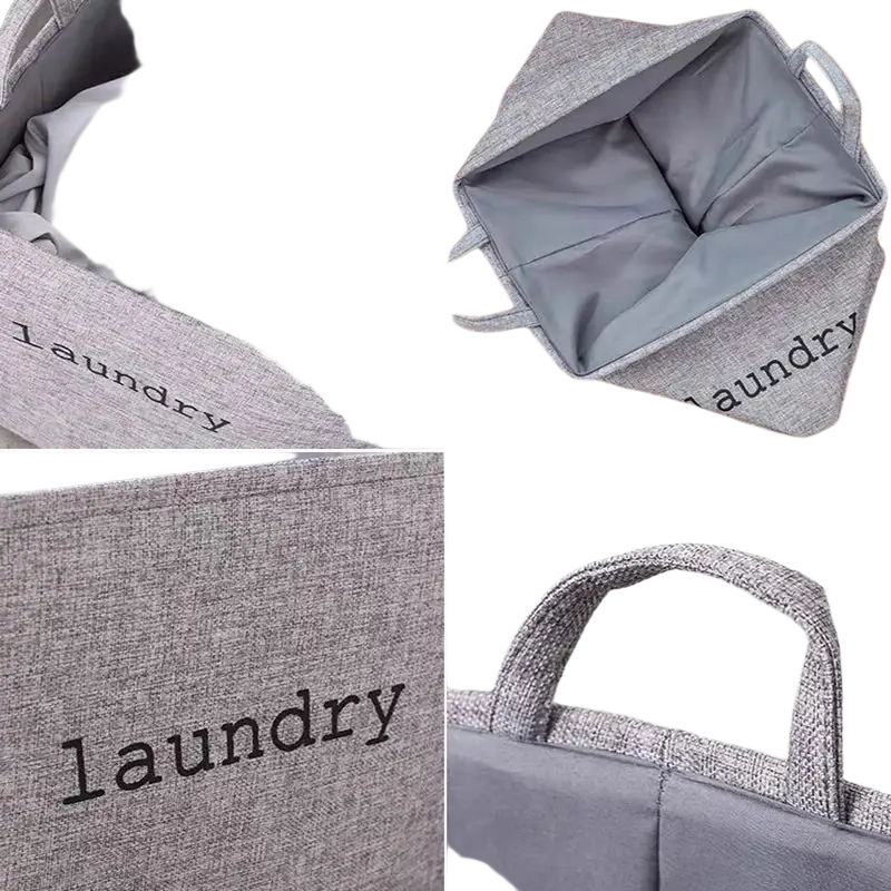 Foldable laundry basket made of gray textured fabric with black embroidered laundry text and matching handles for storage baskets