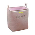 Pink woven fabric foldable laundry basket with handles and laundry print ideal for storage baskets and organization