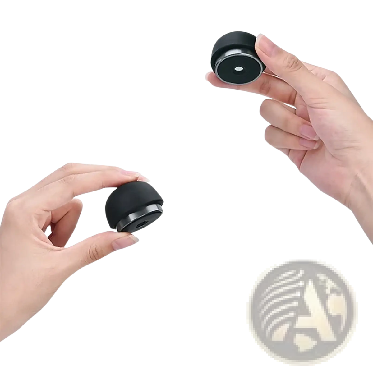 Black circular wireless earbuds with matte finish and metallic accents shown alongside a foldable mini laptop stand cooling holder