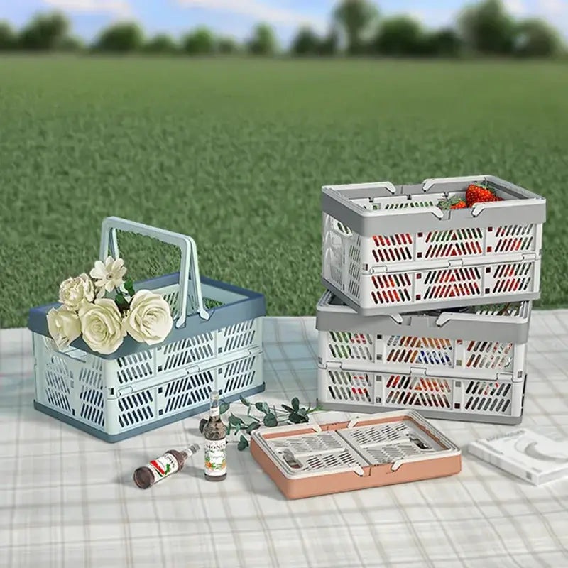 Light blue and white foldable plastic storage basket filled with artificial cream-colored roses for picnic use