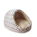 Cream-colored foldable plush pet cave bed with blue and pink star pattern made of soft material for small dogs and cats