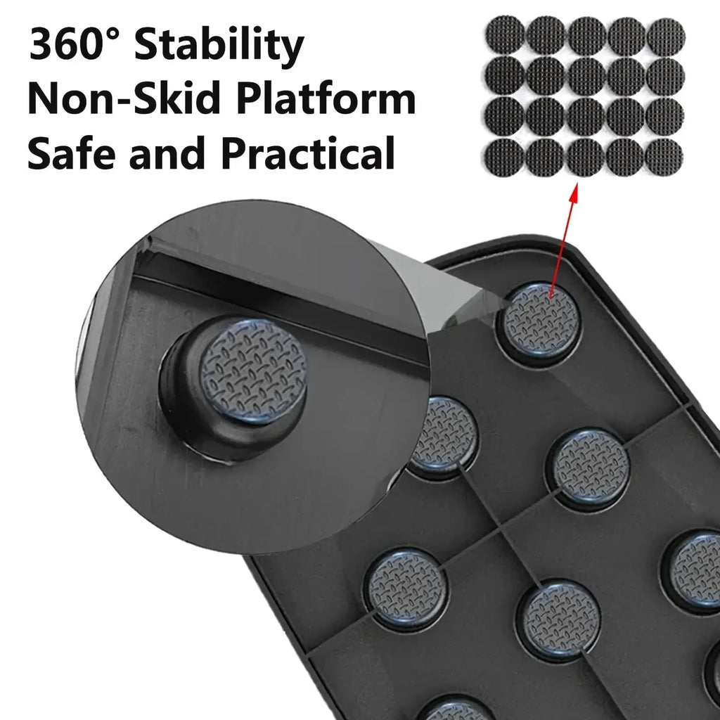 Black plastic foldable push up board platform with textured non-skid circular pads for stability and training