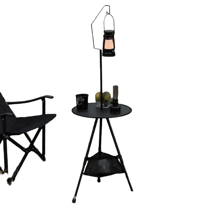 Black metal foldable round table with aluminum alloy tripod legs and lower mesh shelf topped by illuminated lantern