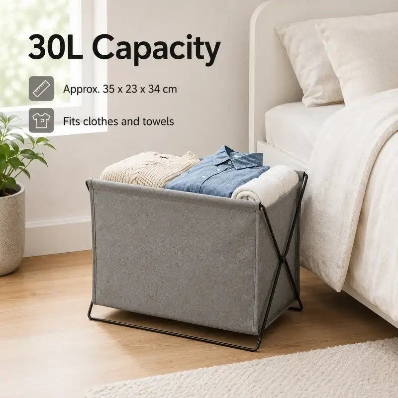 Foldable gray fabric storage basket with sturdy black metal frame for laundry and organization use