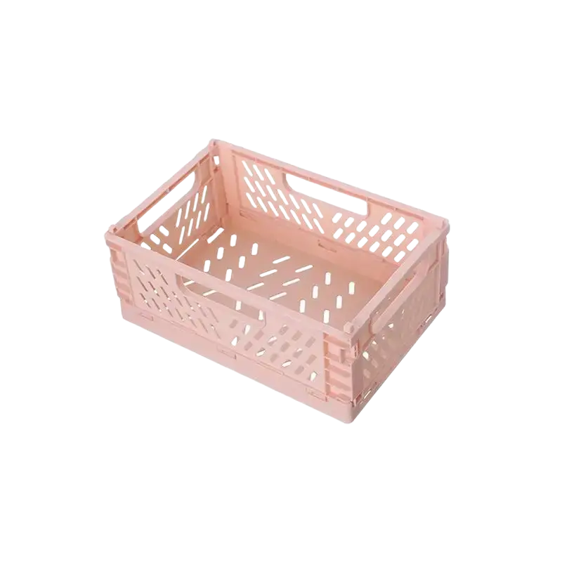 Pink plastic foldable storage basket with geometric lattice pattern and integrated handles for convenient storage