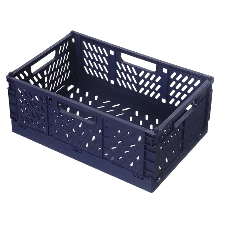 Navy blue foldable storage basket made of plastic with geometric lattice pattern and integrated handles for easy storage