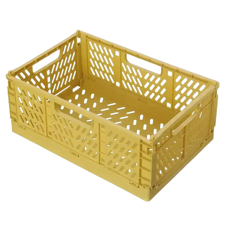 Yellow plastic foldable storage basket with lattice pattern and integrated handles for stackable storage use