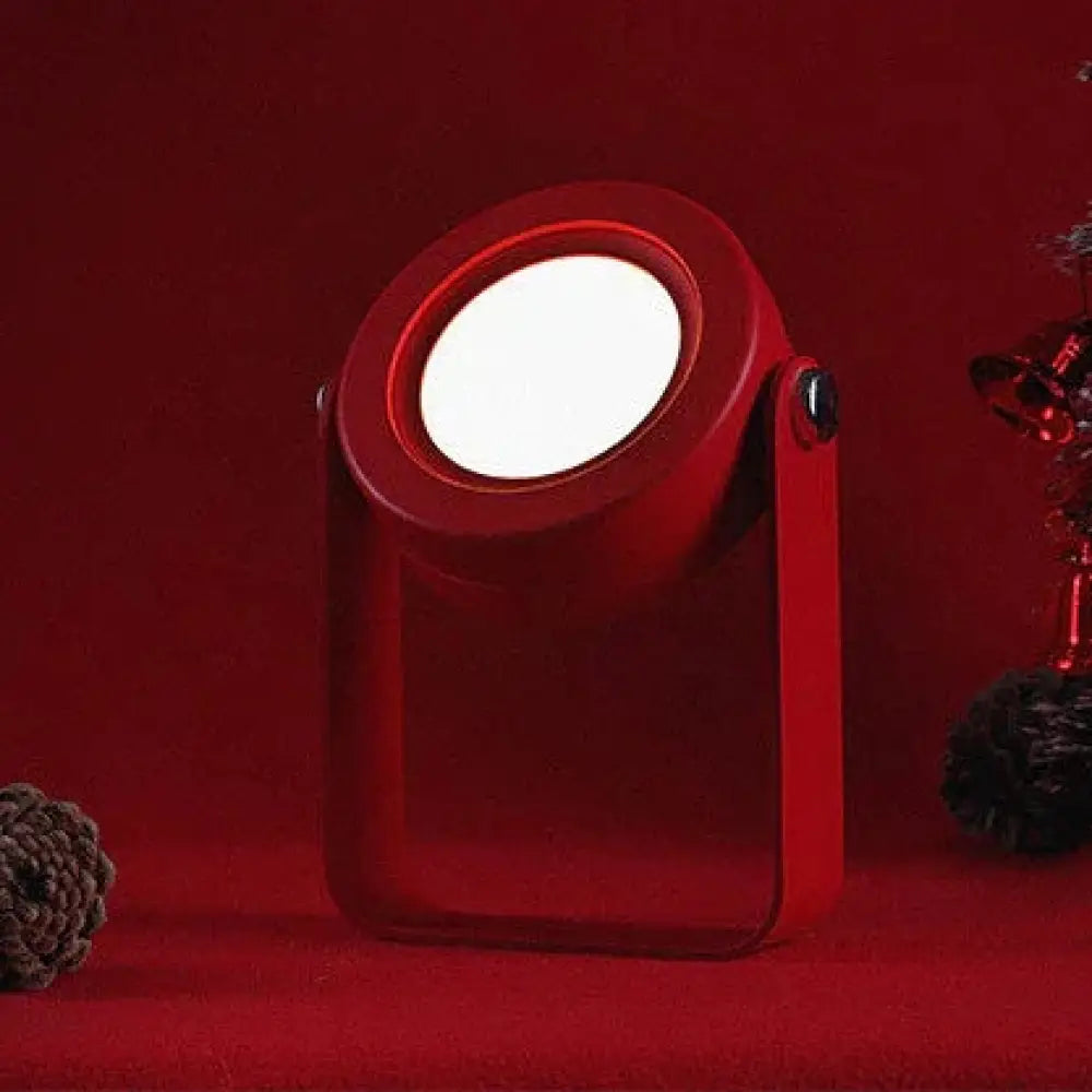 Red foldable touch dimmable led lantern and portable table lamp with bright white illuminated center and modern design