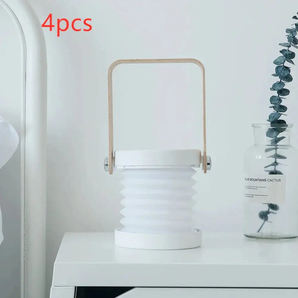 White foldable touch dimmable led lantern with gold-toned metal handle collapsible portable table lamp