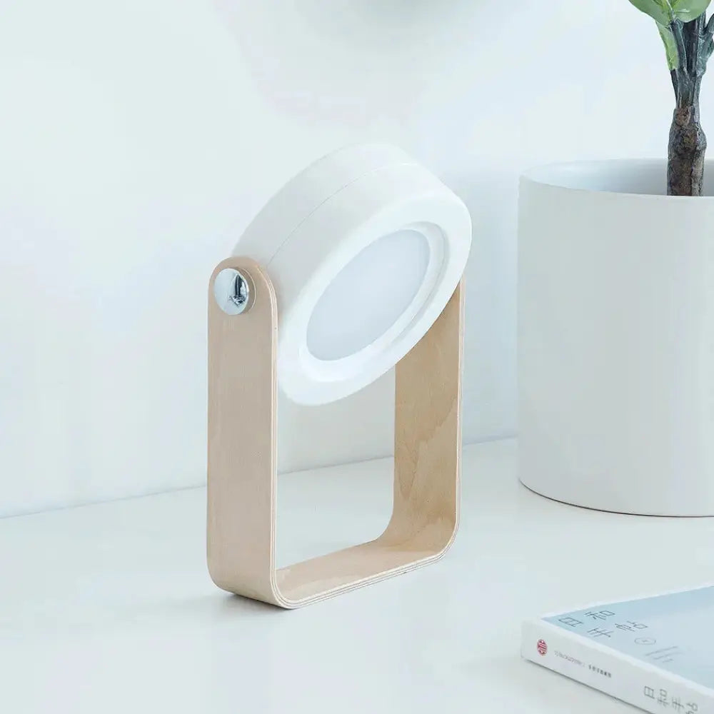 Foldable touch dimmable led lantern and portable table lamp with minimalist white led light and light wood frame