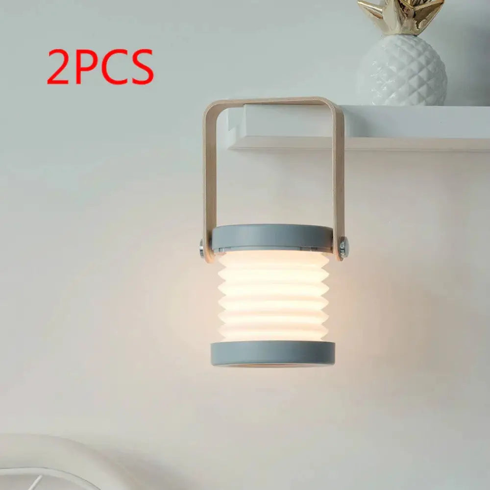 Foldable touch dimmable gray led lantern with collapsible design metal handle and soft warm light for portable use