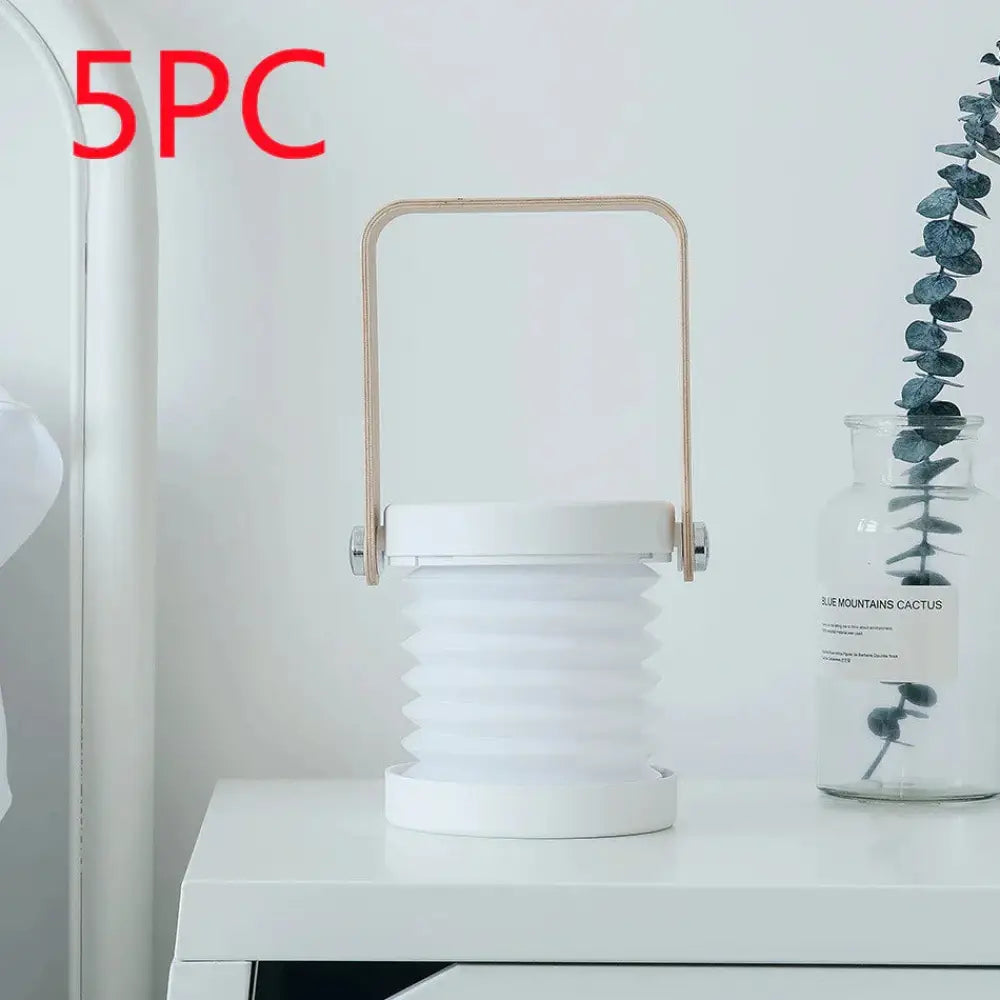 White foldable touch dimmable LED lantern with a wooden handle collapsible for portable table lamp use