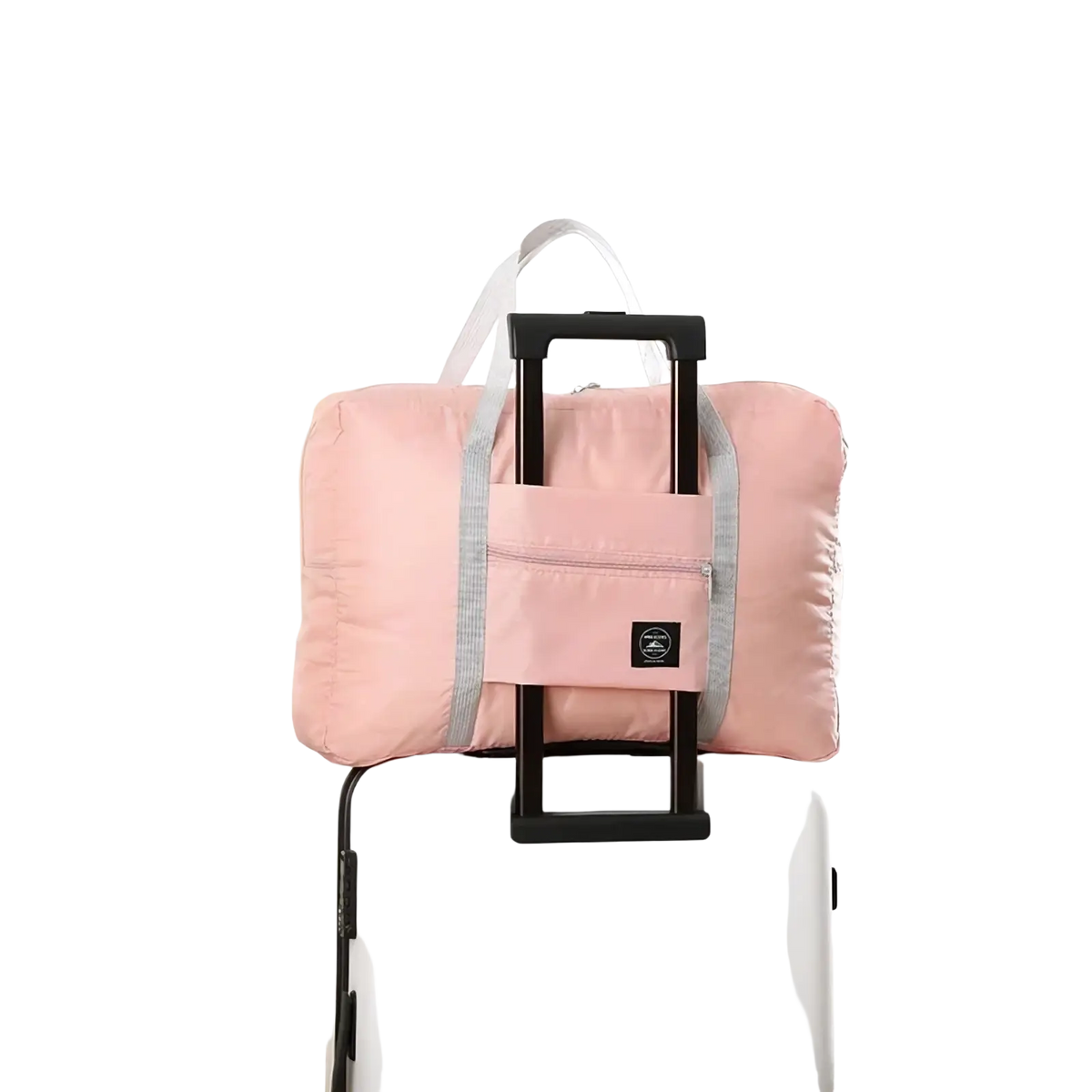 Foldable travel duffel bag lightweight carry in pink with gray trim and black handle attachment for easy portability