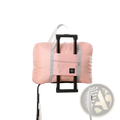 Foldable travel duffel bag lightweight carry in pink with gray trim and black handle attachment for easy portability