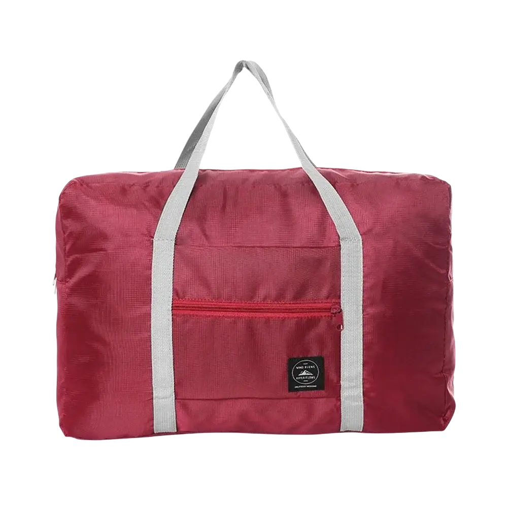 A compact maroon foldable travel duffel bag with gray fabric handles and front zippered pocket waterproof luggage tote