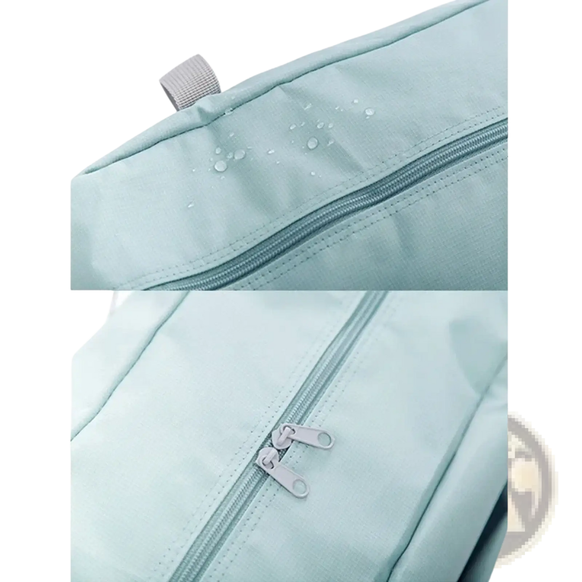 Light blue foldable travel duffel bag made of waterproof fabric with silver zipper pulls and gray strap tab