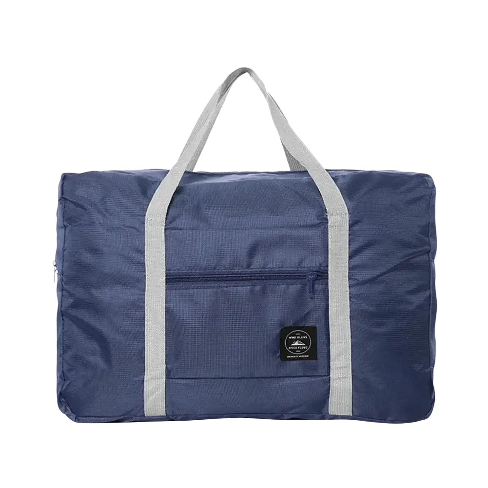 Navy blue foldable travel duffel bag with gray reinforced handles and front zippered pocket with black brand patch