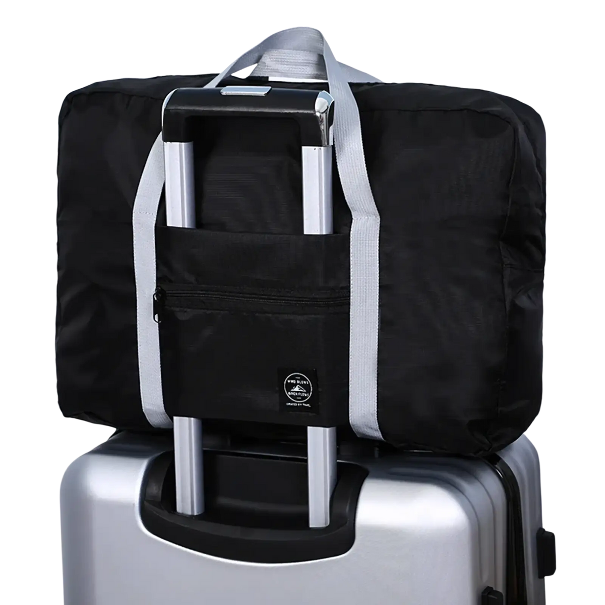 Black foldable travel duffle bag with gray straps made of lightweight nylon designed to attach to suitcase handles