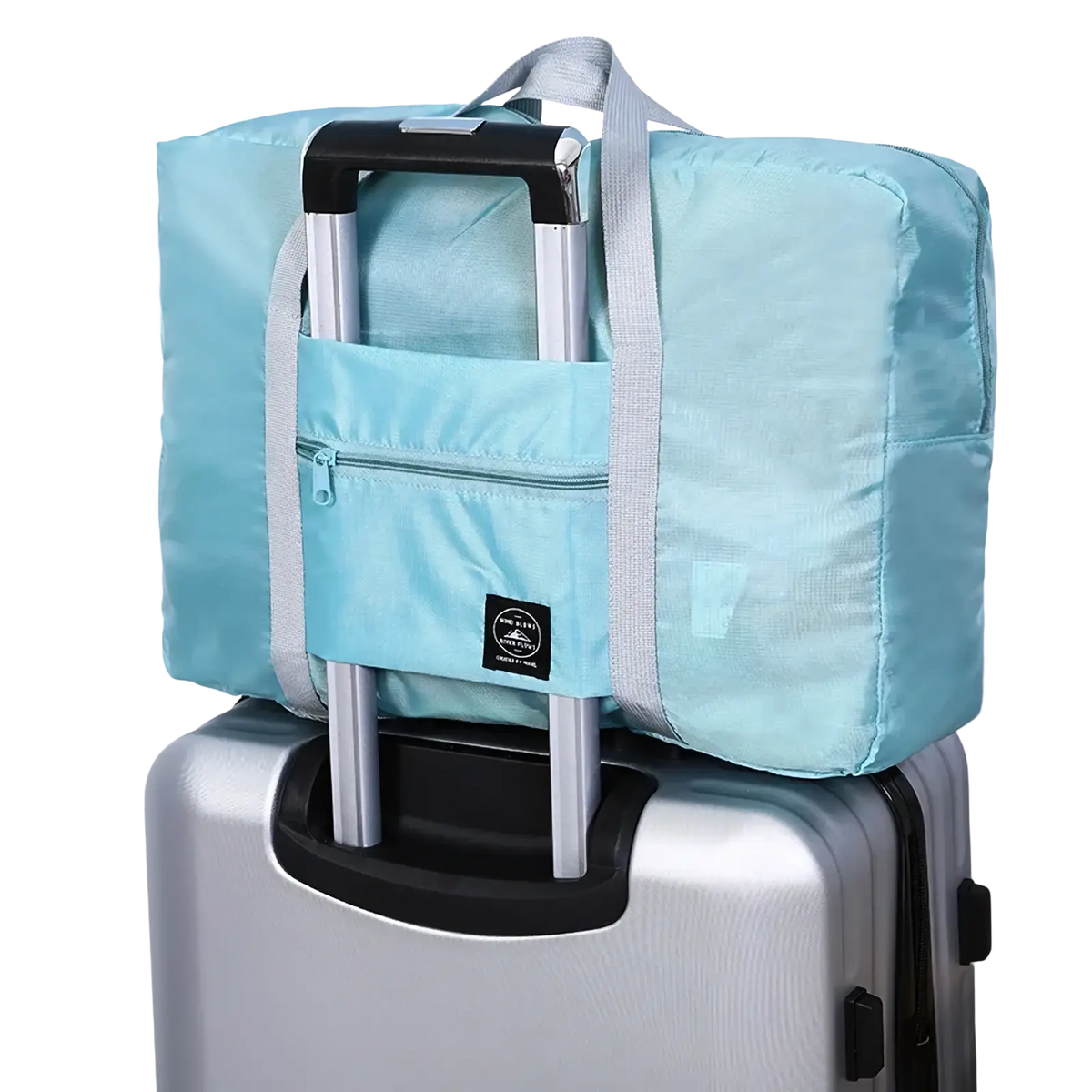 Light blue foldable travel duffle bag with gray straps and front zippered pocket made of lightweight nylon tote