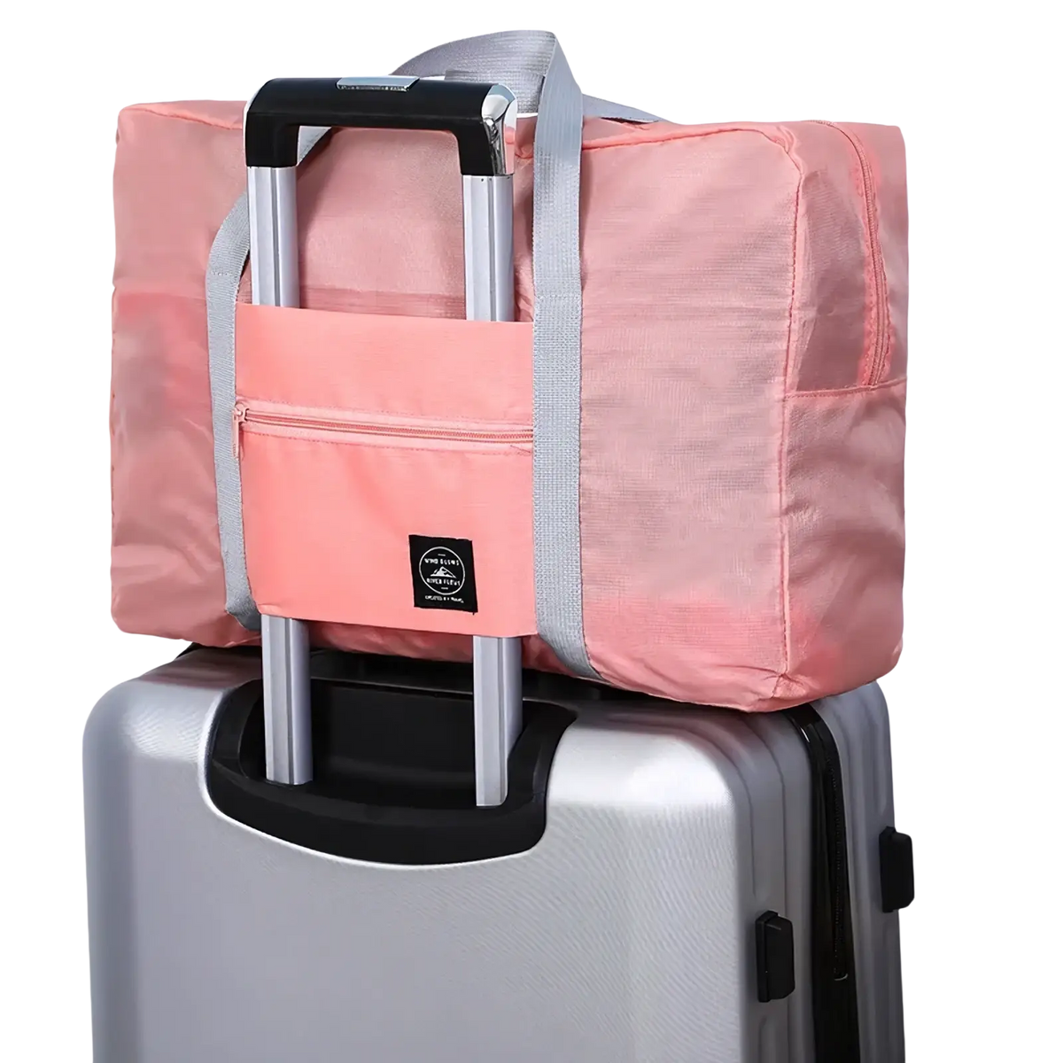 Pink foldable travel duffle bag with gray straps and front zippered pocket made of lightweight nylon for travel convenience