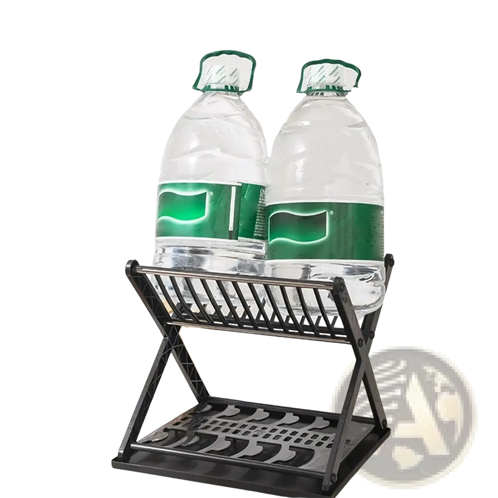 Black foldable metal dish rack with double layers holding two large clear water bottles with green caps and labels