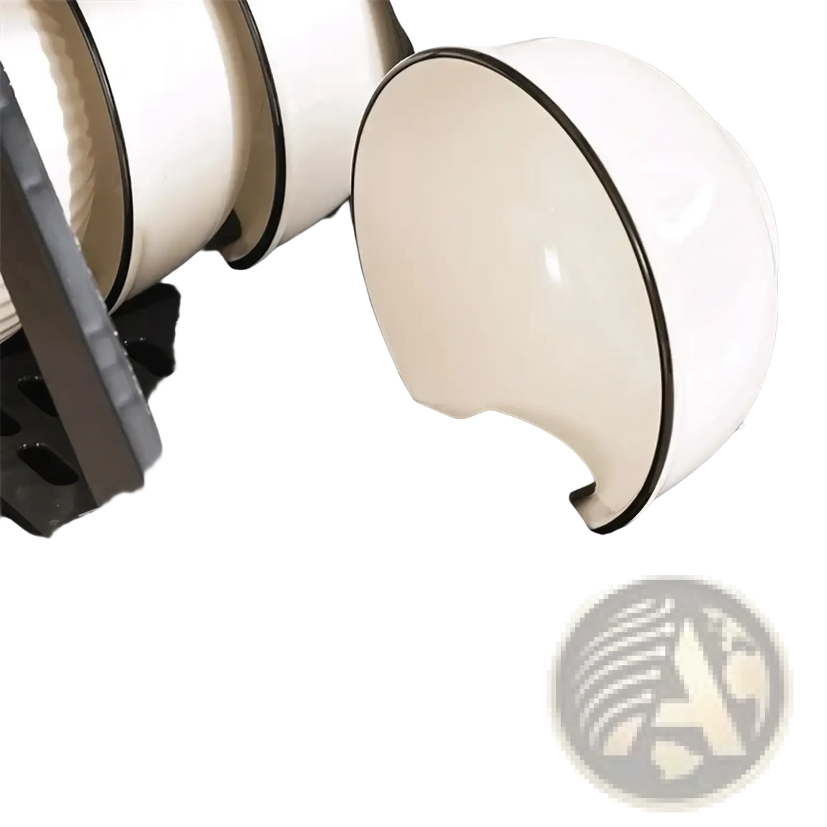 White ceramic bowl with black rim resting on foldable x-type double layer black plastic dish drying rack