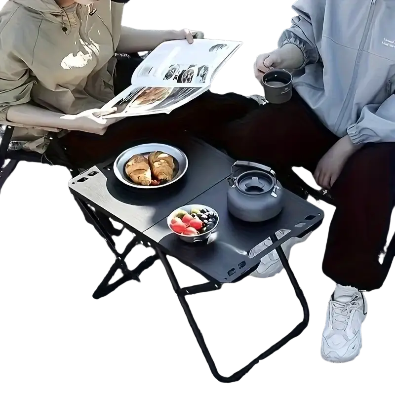 Black foldable camping table with matte finish and sturdy metal frame made in mainland china for outdoor use