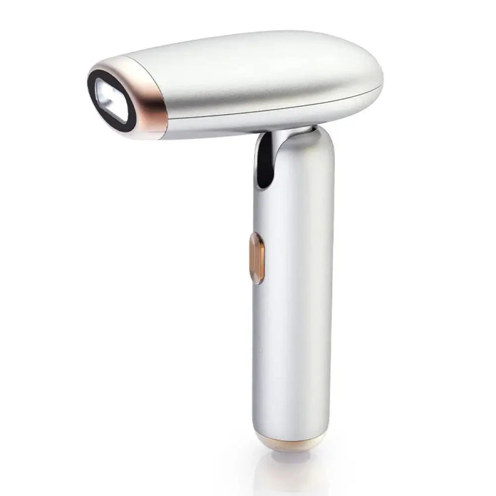 Silver and rose gold handheld folding IPL laser hair removal device with compact and sleek modern design