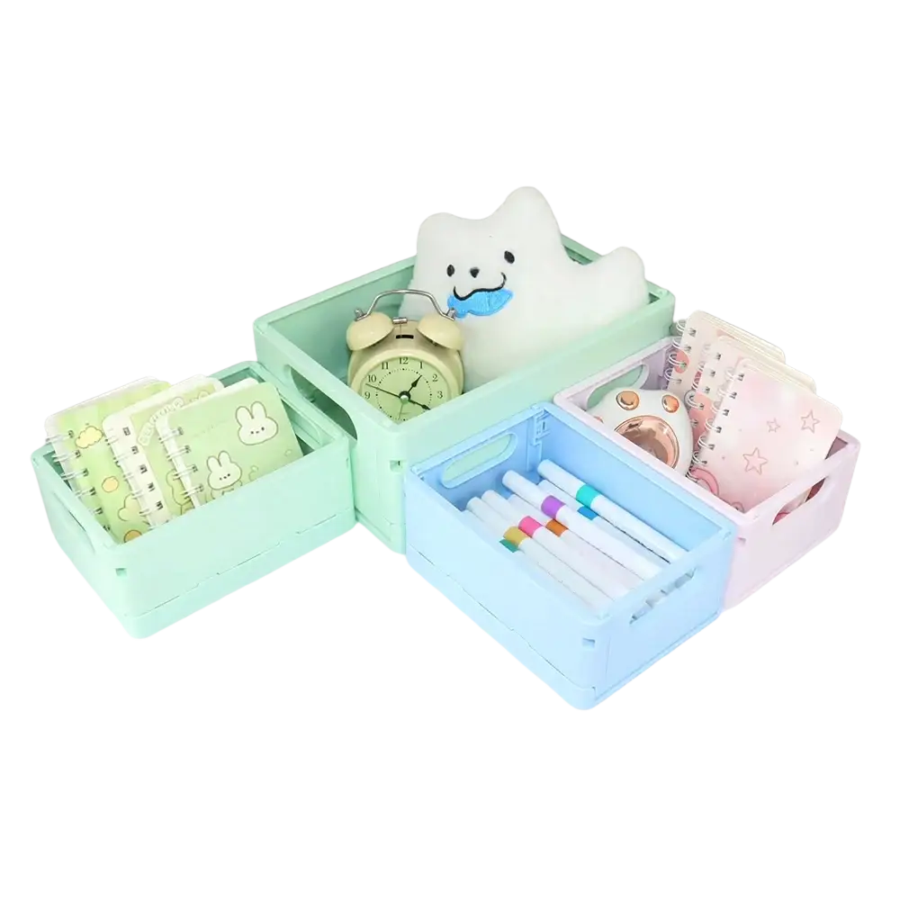 Pastel-colored folding storage boxes made of plastic with handles and a white plush toy inside one storage boxes basket