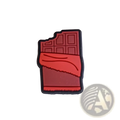 Red chocolate bar shaped food themed shoe charm with black outline and textured surface for sandals and clogs