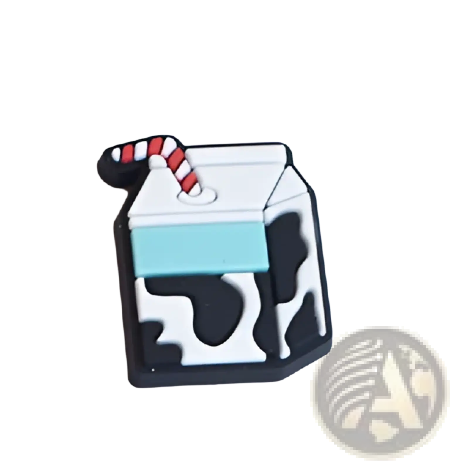 Enamel pin shaped like a black and white cow-print milk carton with a red and white striped straw for sandals and clogs