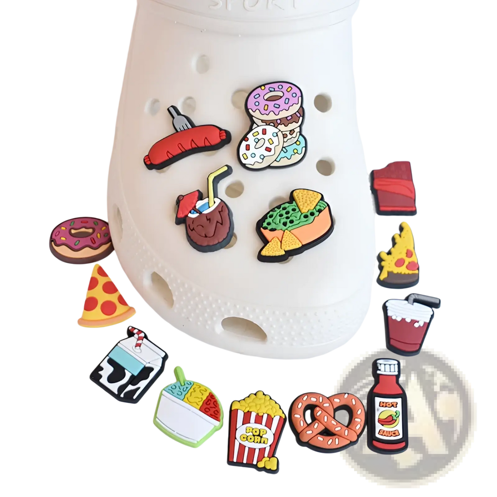White croc shoe with colorful food themed silicone charms attached to the sides for sandals and clogs use