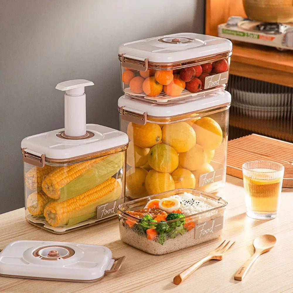 Clear plastic Arbaglobal vacuum seal food storage containers with white lids gold clasps and food labels on sides