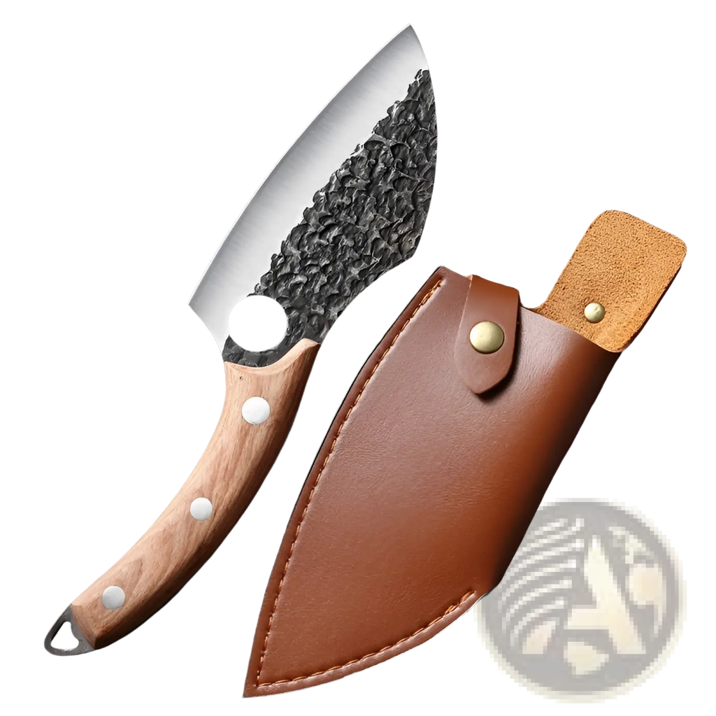 A rustic forged high carbon steel outdoor chef knife with hammered blackened blade and light wood handle beside brown sheath