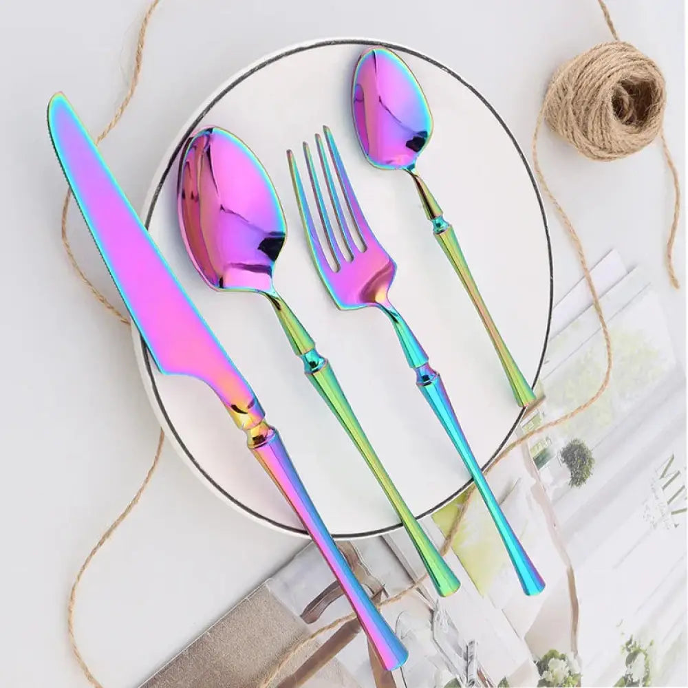Modern 4-piece stainless steel steak cutlery set with rainbow-finished iridescent handles and slender design