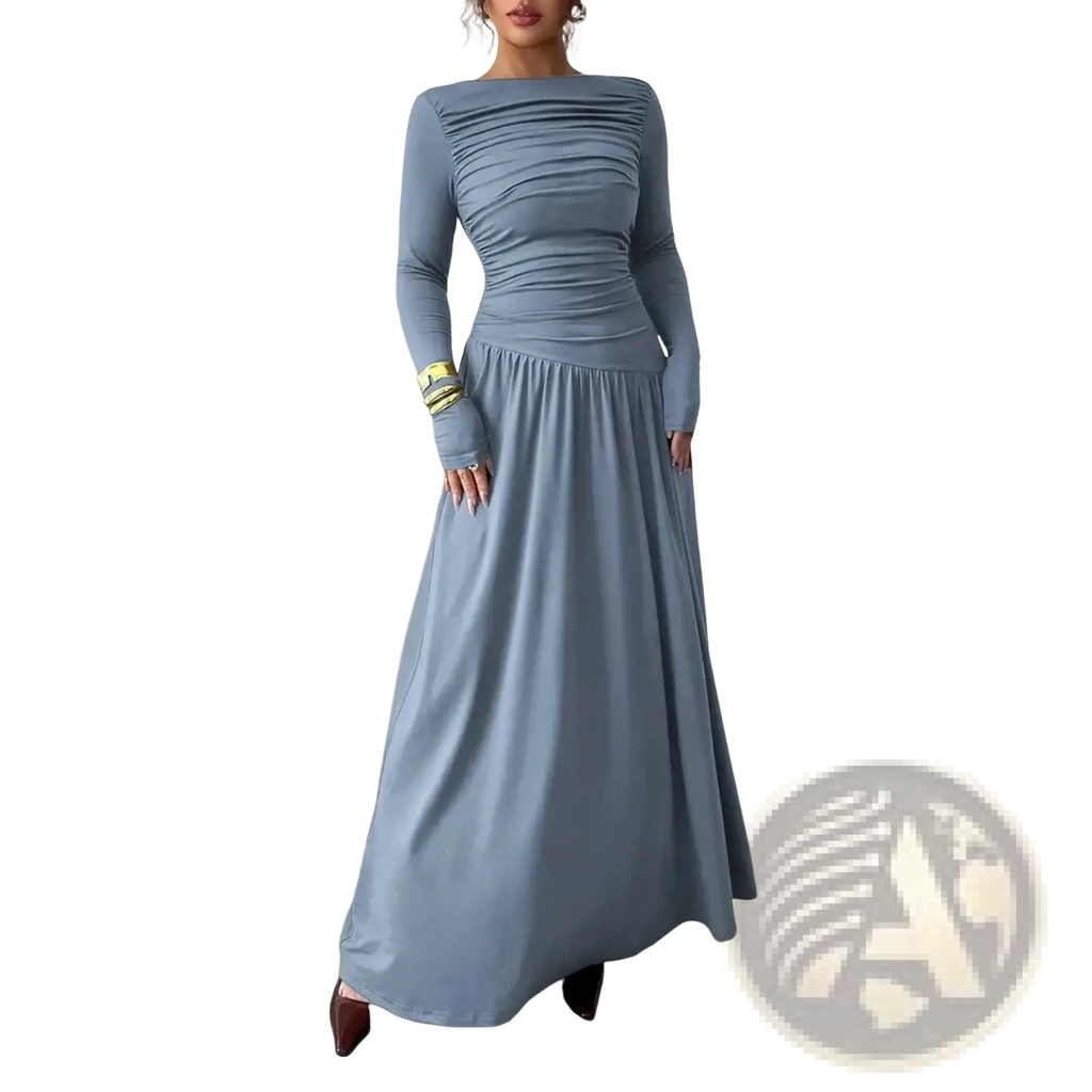 A sleek gray long sleeve formal maxi dress with a ruched bodice and flowing skirt perfect for evening wear