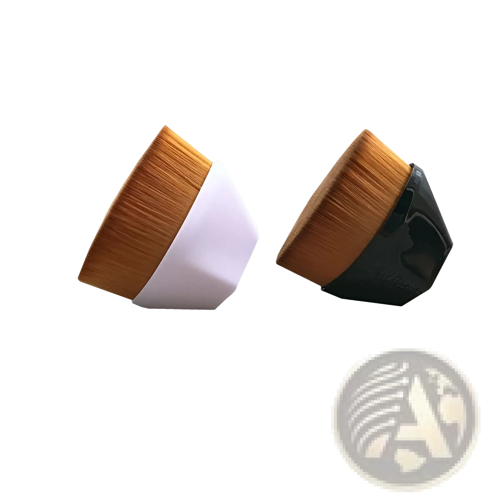 Two angled foundation brushes with dense golden brown bristles and sleek white and black plastic handles for makeup application