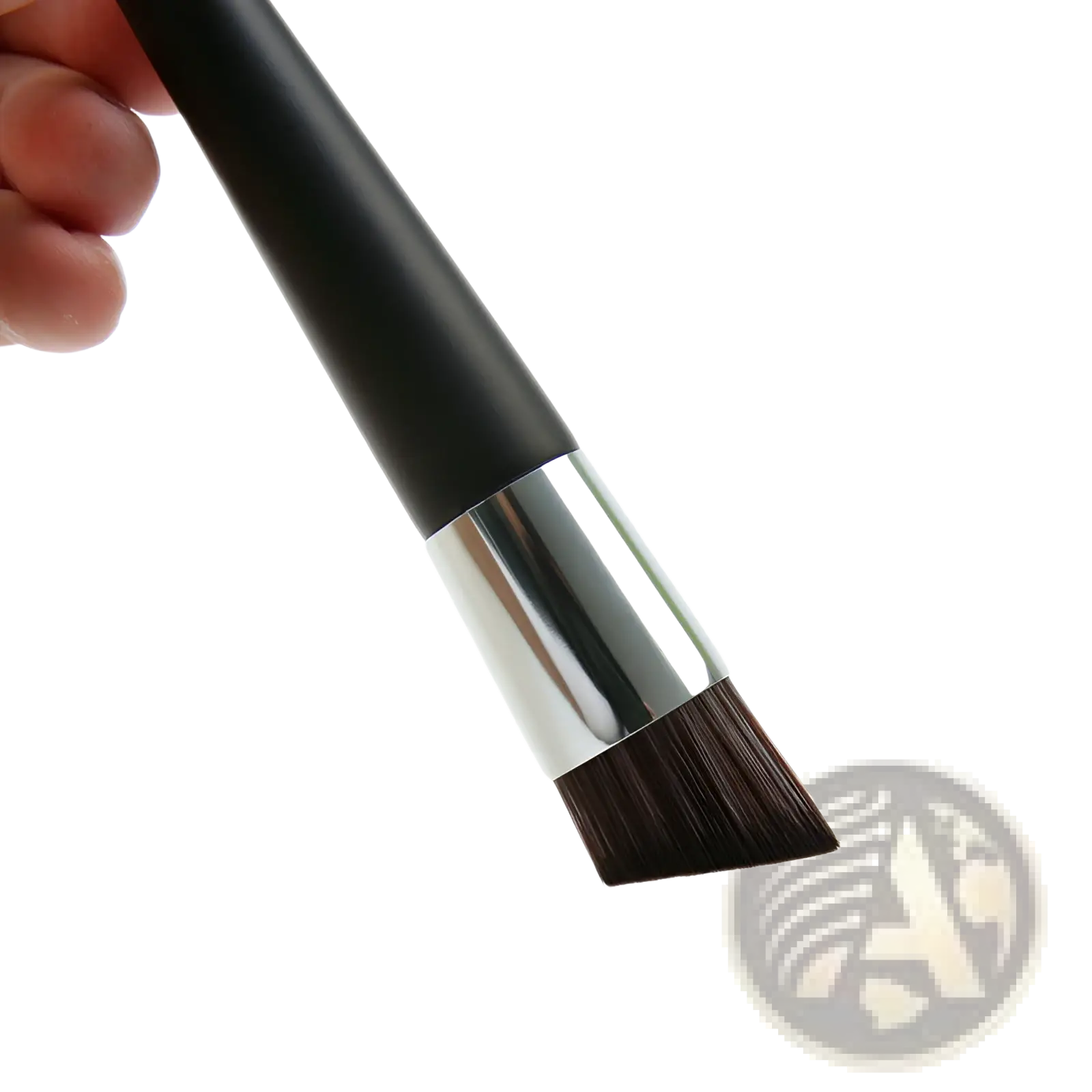 Foundation brush with black wooden handle silver ferrule and dark brown angled bristles for makeup application