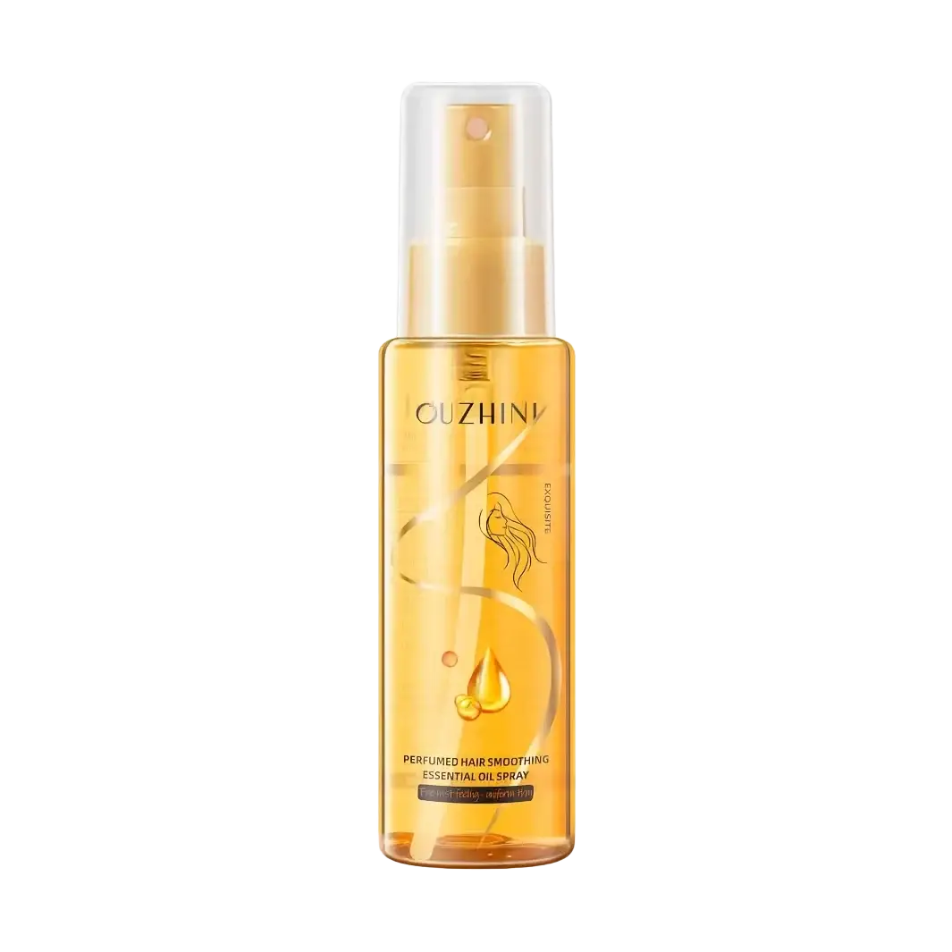 Golden transparent bottle of ouzhini fragrance hair care essential oil spray with gold-tone nozzle and elegant design 100ml