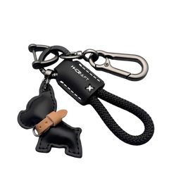 Black leather French bulldog keychain with braided cord, metal carabiner clips, and stitched h.craft brand tag