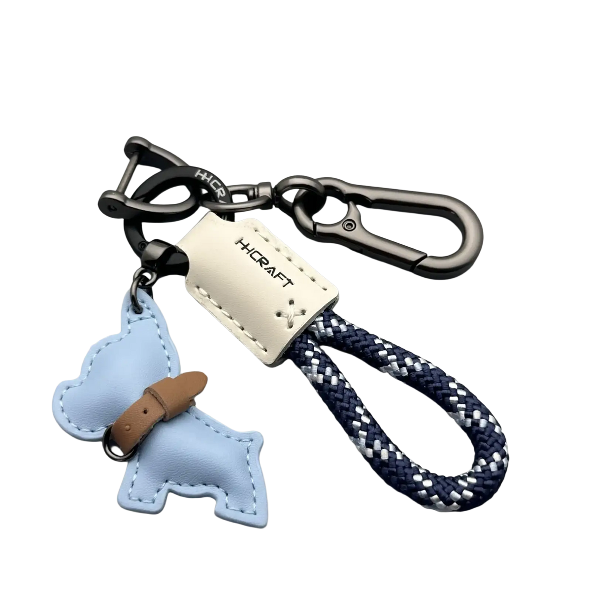 French bulldog leather keychain in light blue with brown belt detail and navy white braided rope loop with metal plate